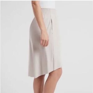 ATHLETA Cosmic Skirt Size L Hi Low Hem Elastic Waist Stretch Zip Pockets Neutral